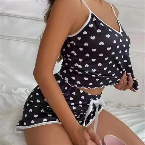 women's summer pajama set in black with white hearts, perfect for lounging