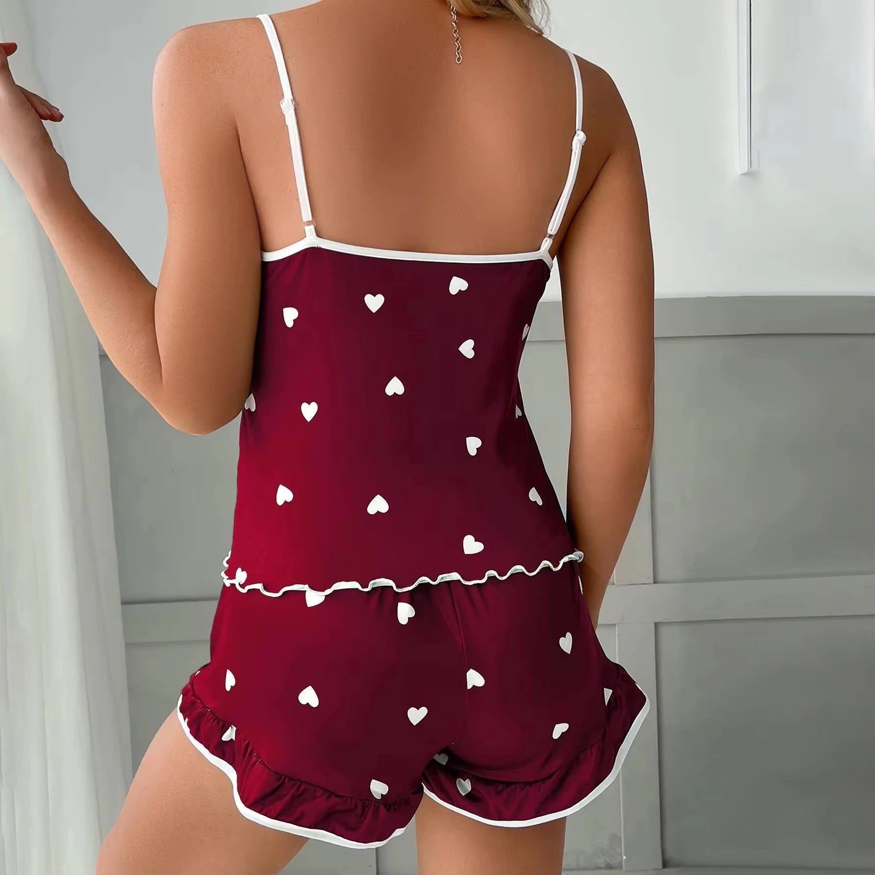 Women's summer pajama set in burgundy with white hearts, perfect for lounging