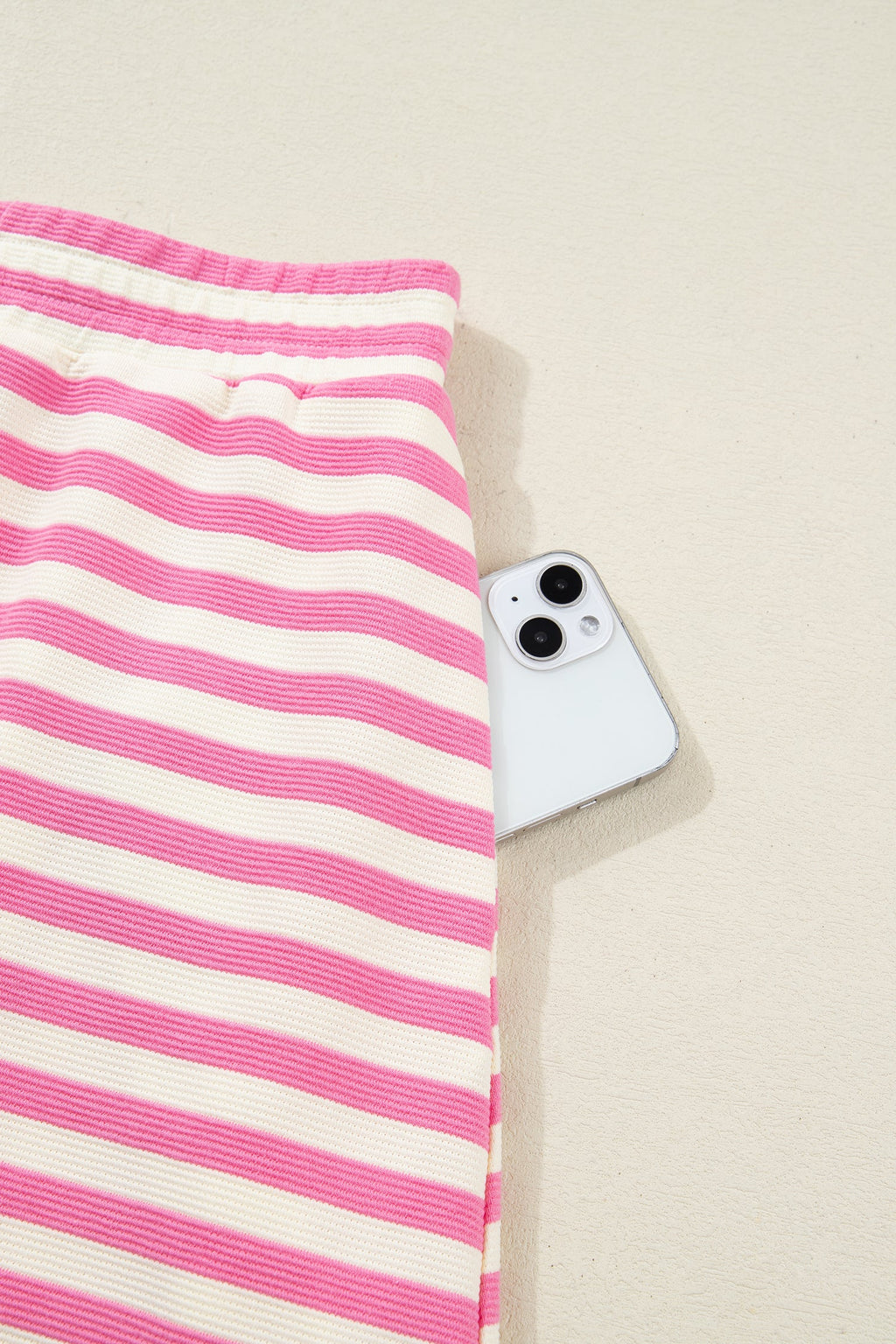 Women's striped pink and white skort set, perfect for summer outings