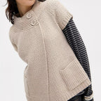 Women's cozy cream sweater, soft knit, perfect for winter outings
