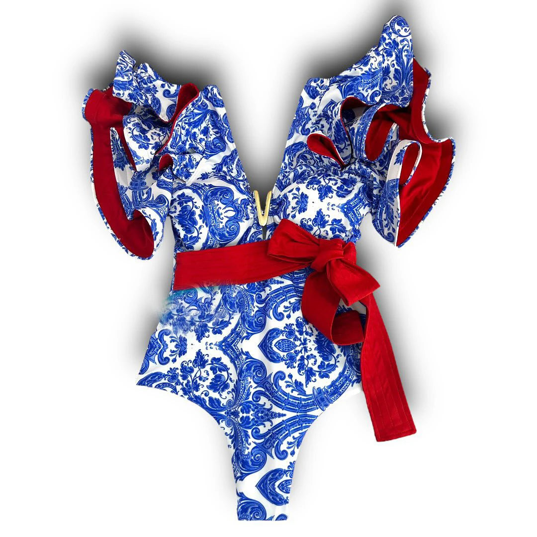 Womens vacation bathing suits, blue and white floral one-piece with red belt