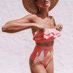 Women's striped red bikini set, perfect for beach vacations