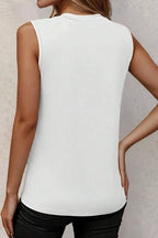 Back view of women's white pleated tank top by YNIQUE, perfect for casual summer outfits