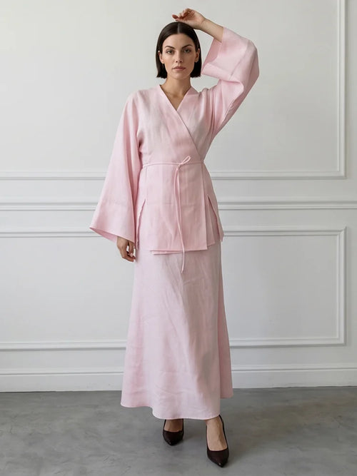 Women's pink wrap skirt made of lightweight fabric, stylish for casual outings