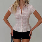 Women's pink plaid shirt, fitted style for y2k fashion.