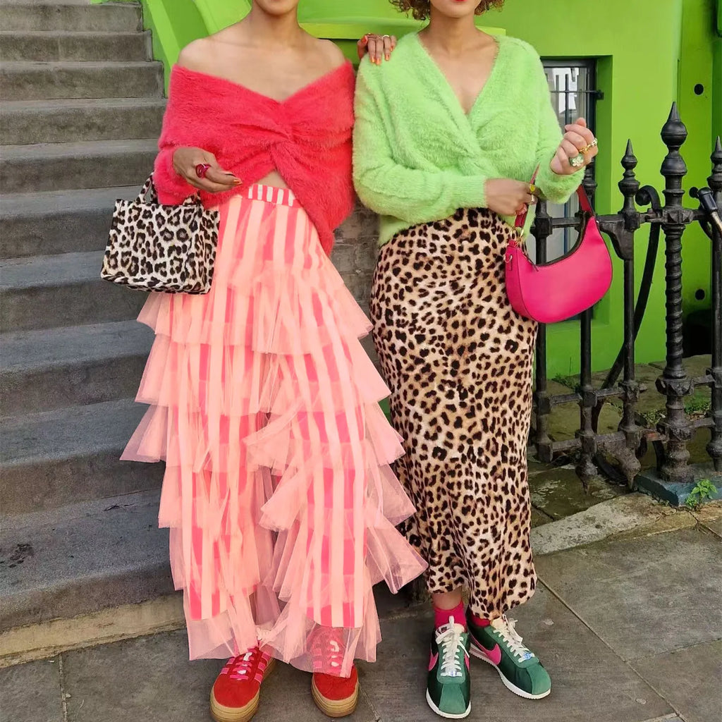 Women's pink tiered skirt from VacationGrabs, perfect for y2k fashion enthusiasts