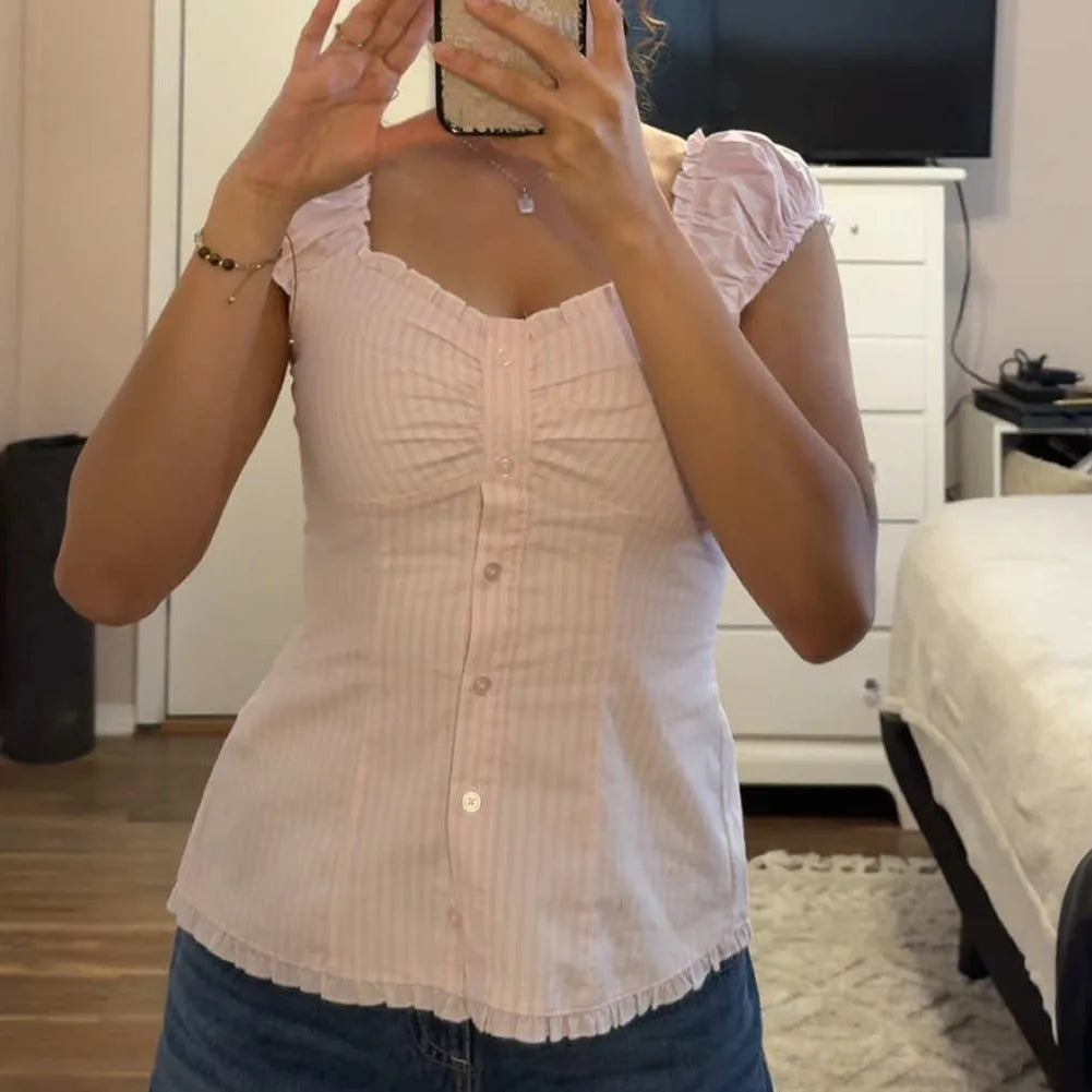 Women's pink y2k shirt in lightweight fabric, perfect for casual outings