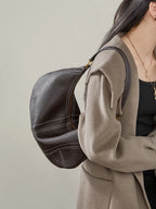 Women's leather crossbody mini bag in dark brown, perfect for everyday use