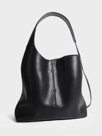 Black leather tote bag, stylish accessory for daily use
