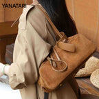 Brown suede tote bag, stylish accessory for daily use