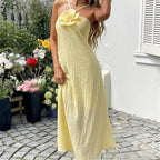 Yellow floral strapless maxi dress for summer outings