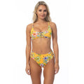 Beach Joy yellow island print bikini set with floral design and adjustable straps on model