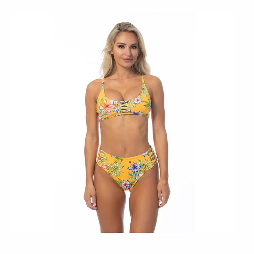 Beach Joy yellow island print bikini set with floral design and adjustable straps on model