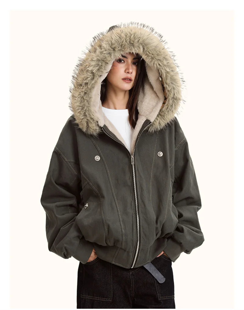 Women's green Barbour jacket padded with faux fur hood for winter warmth