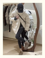 Women's hooded puffer jacket in cream, warm for winter outings
