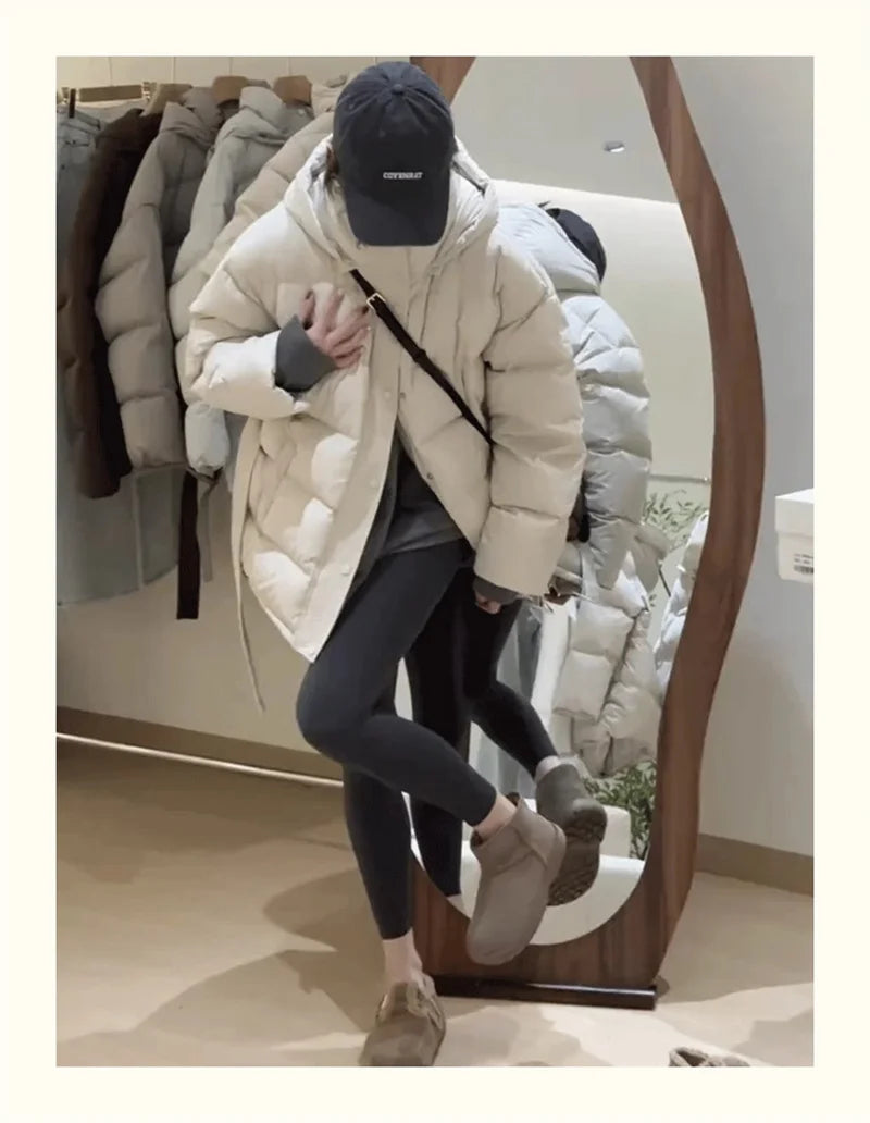 Women's hooded puffer jacket in cream, warm for winter outings