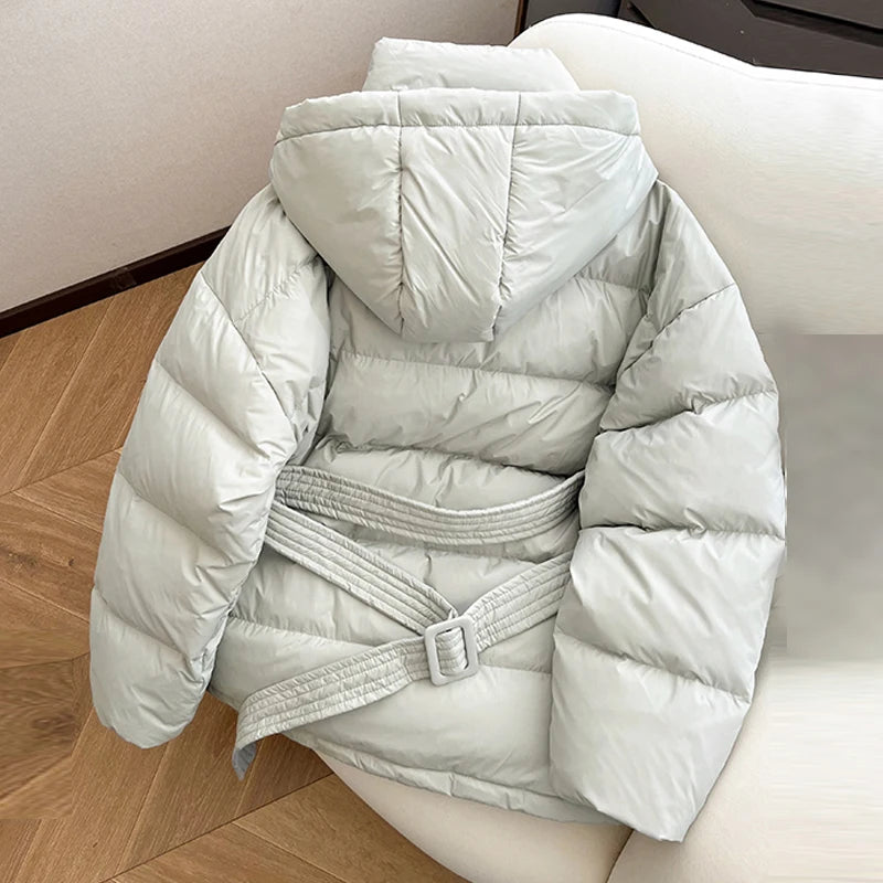 Women's light grey hooded puffer jacket for cold weather