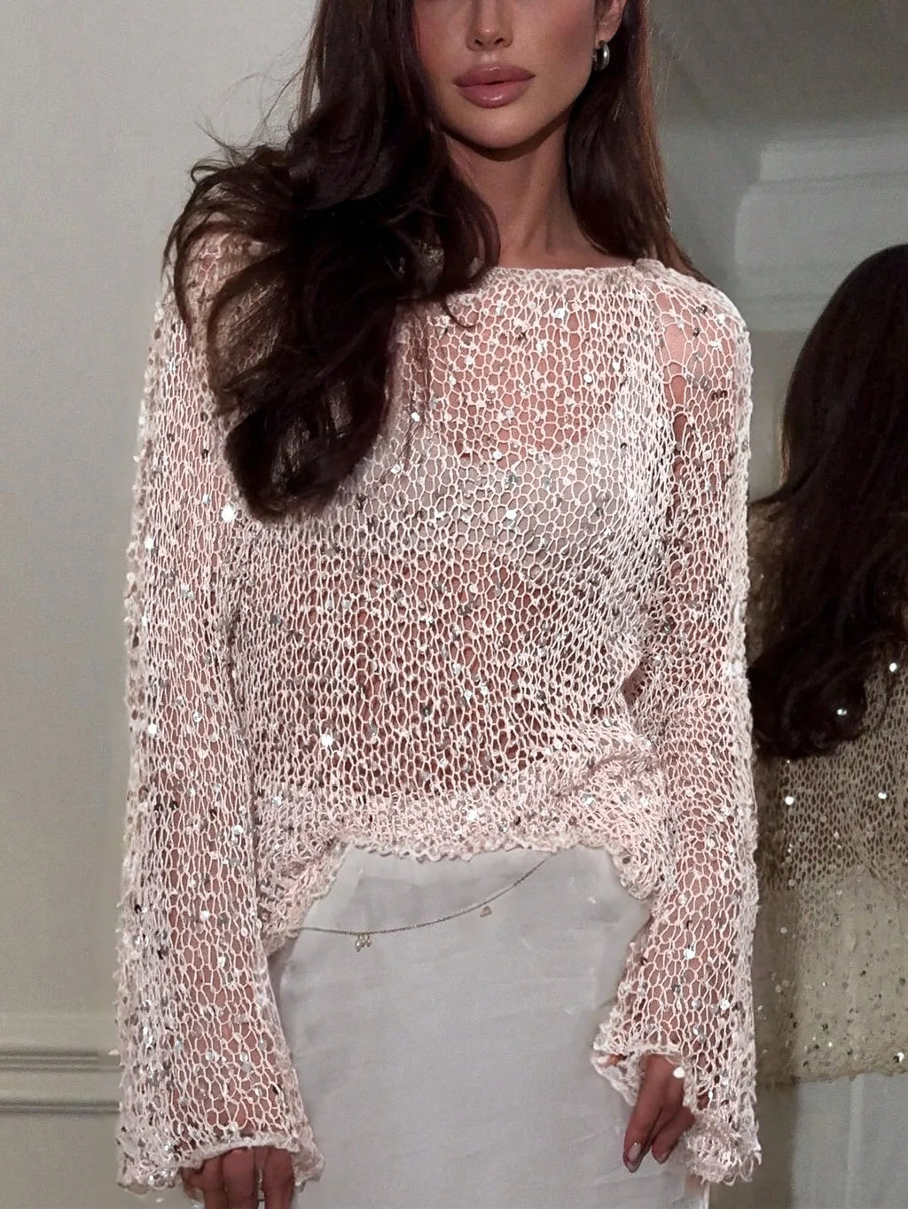 Women's sheer sequin top in light pink for stylish outings