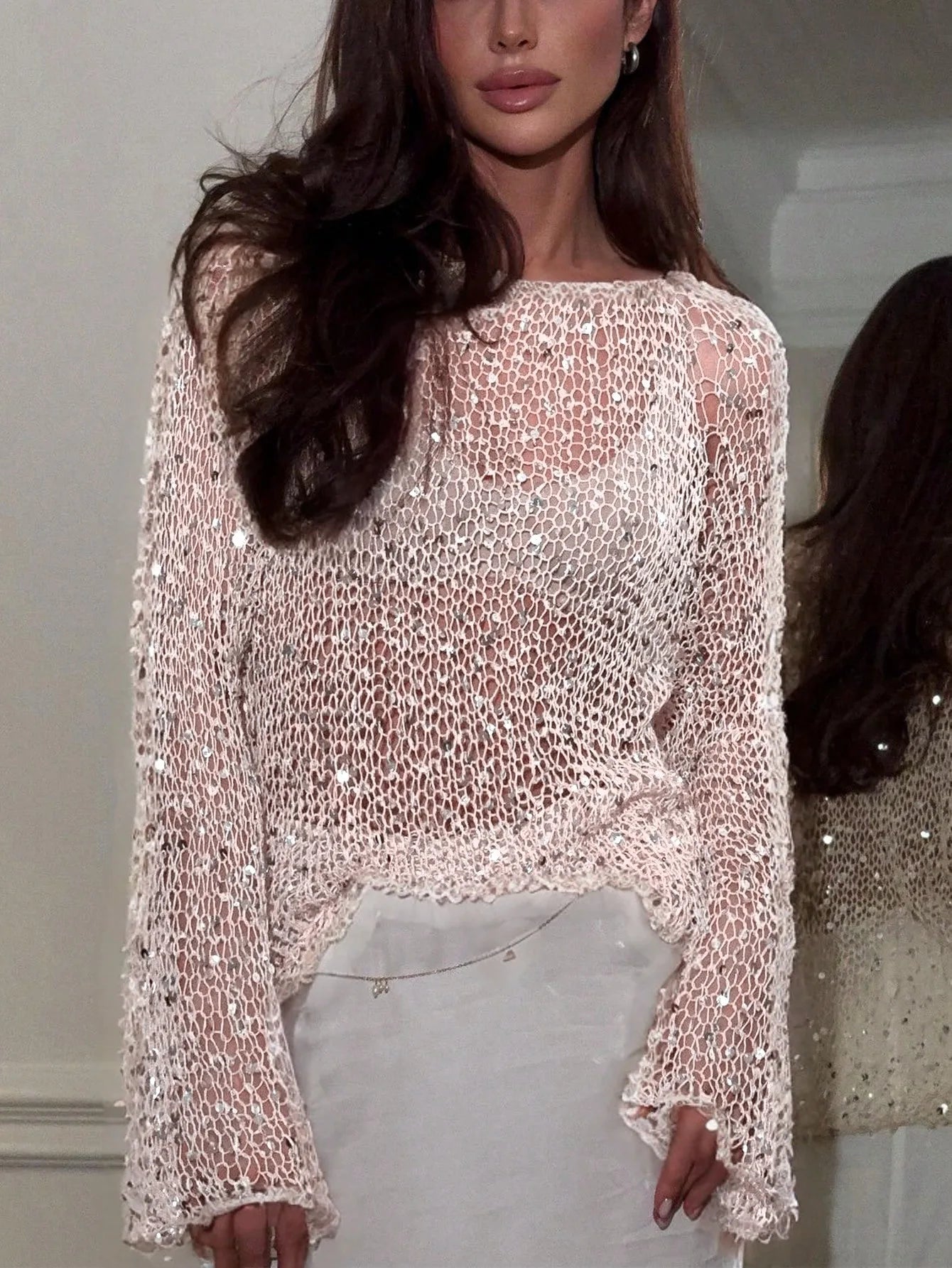 Women's sheer sequin top in light pink for stylish outings