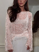 Women's sheer sequin top in light pink for stylish outings