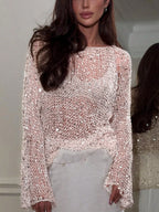 Women's sheer sequin top in light pink for stylish outings