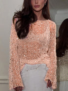 Women's sequin top in peach knit, perfect for summer nights