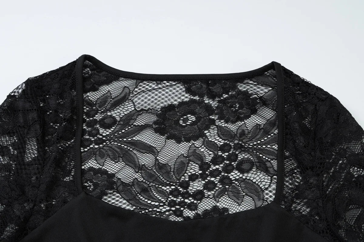 Women's black shirt with mesh detailing, perfect for casual outings