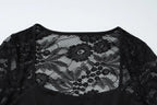 Women's black shirt with mesh detailing, perfect for casual outings
