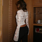 Women's white top with mesh detail, perfect for stylish layering