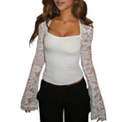 Women's white top with mesh sleeves for stylish casual wear