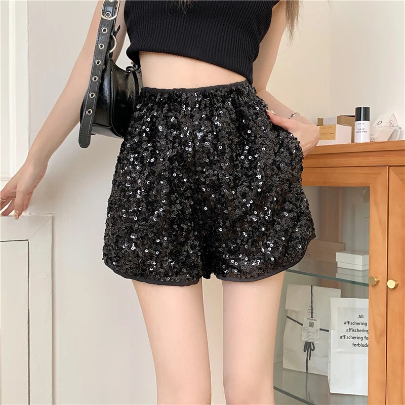 Women's black sequined shorts, vacation worthy clubwear for stylish outings