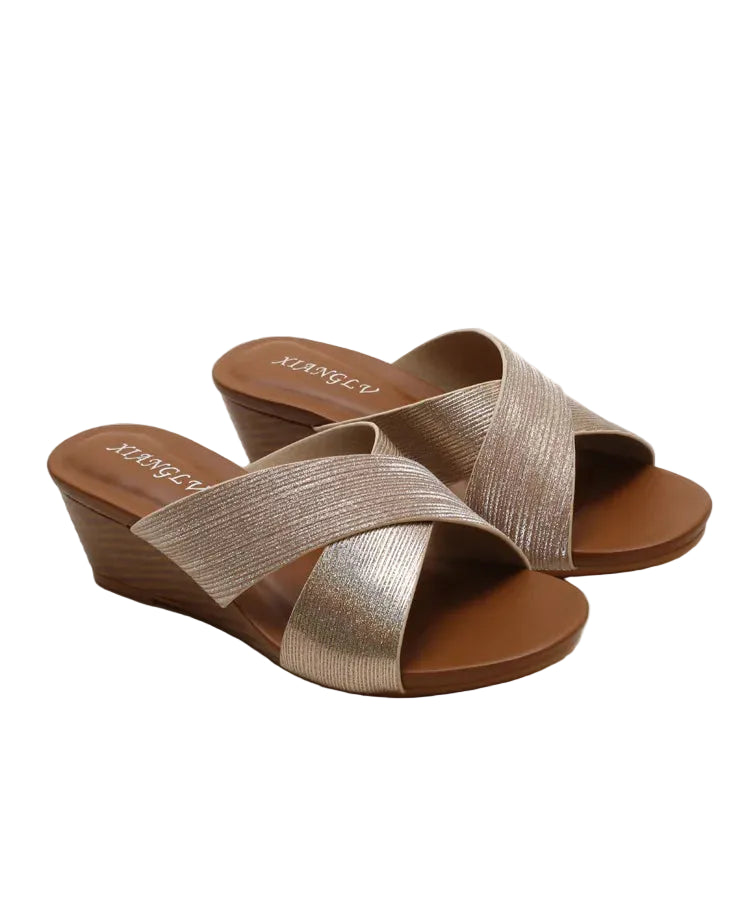 Women's wedge sandals in metallic gold, perfect for summer outings