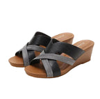 Women's black wedge sandals with cross straps for summer wear