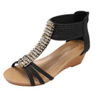 Women's black wedge sandals with rhinestone embellishments for stylish outings