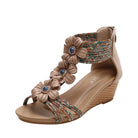Women's beige wedge sandals with floral accents for summer outings