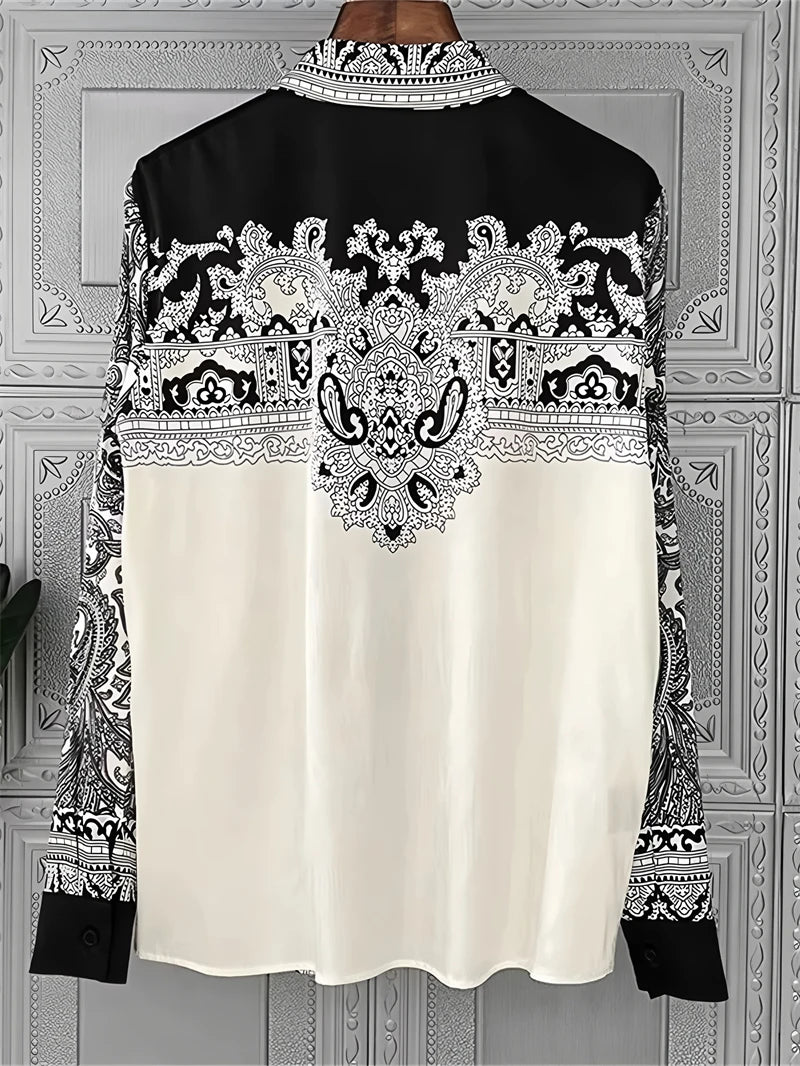 Women's black and white patterned blouse, perfect for stylish casual wear