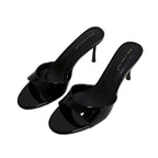 Black glossy heeled women sandals for elegant occasions