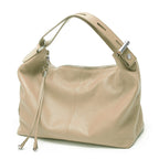 Beige leather coach purse shoulder bag for everyday use