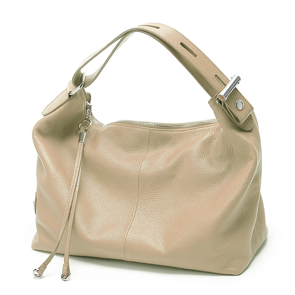 Beige leather coach purse shoulder bag for everyday use