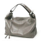 Gray leather coach purse shoulder bag, stylish and versatile