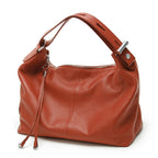 Coach purse shoulder bag in orange leather, perfect for everyday use