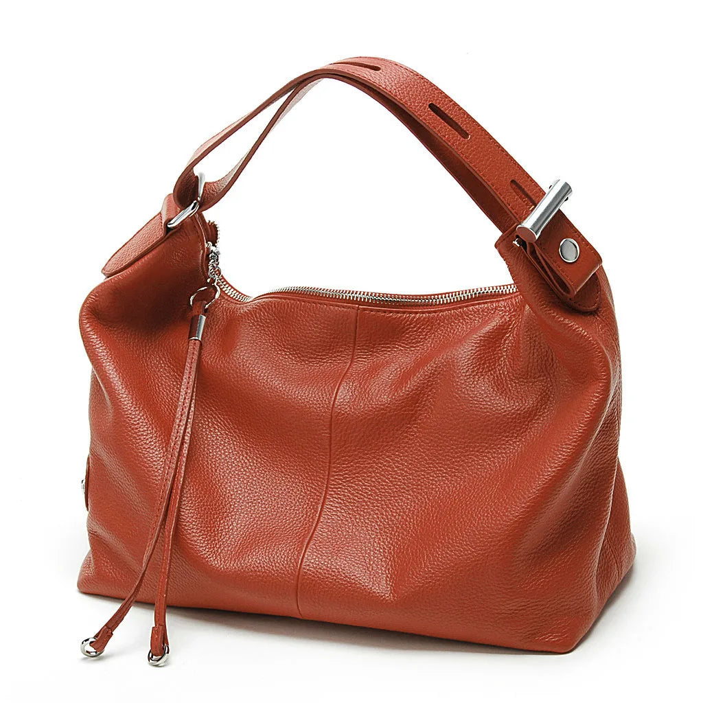 Coach purse shoulder bag in orange leather, perfect for everyday use
