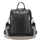 Black leather travel bag with patterned shoulder strap for stylish trips