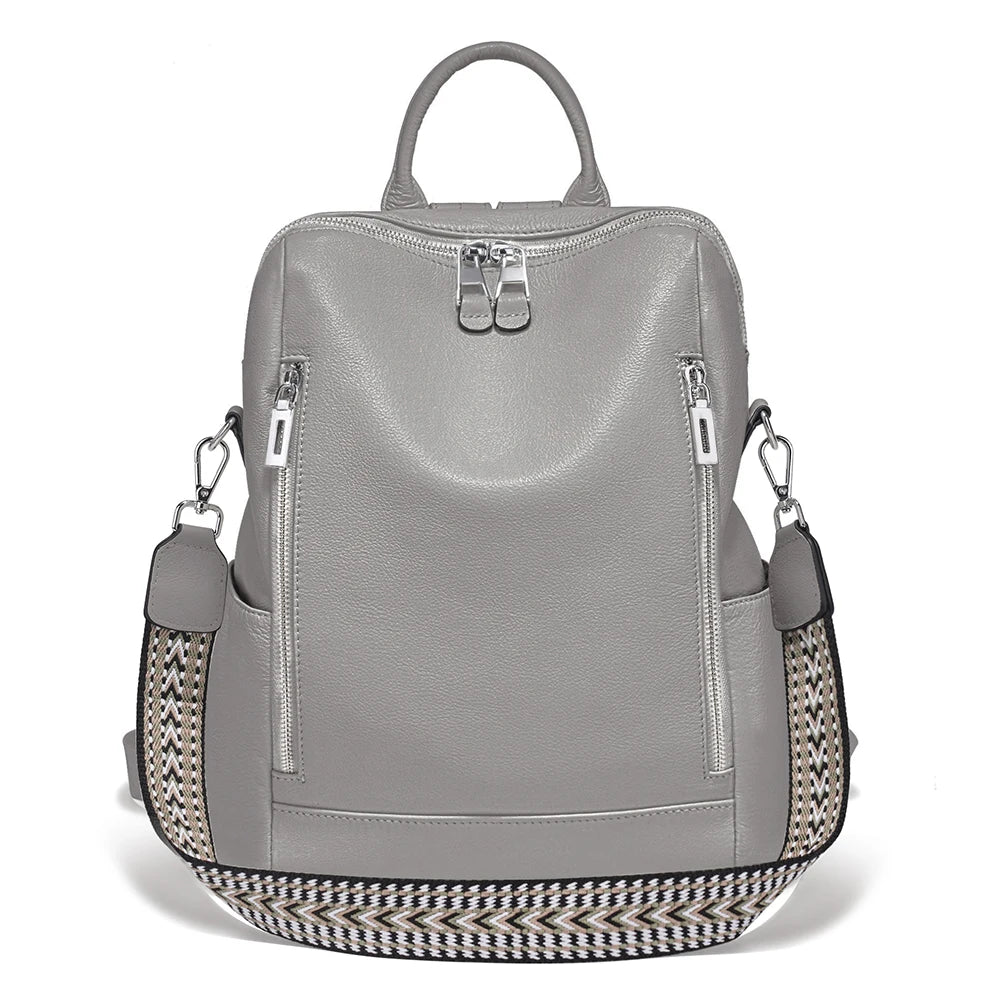 Gray leather travel bag with patterned side panel and dual zippers