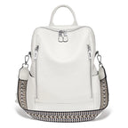 White leather travel bag with stylish zigzag strap for easy carrying