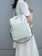 White travel bag with adjustable straps for stylish adventures