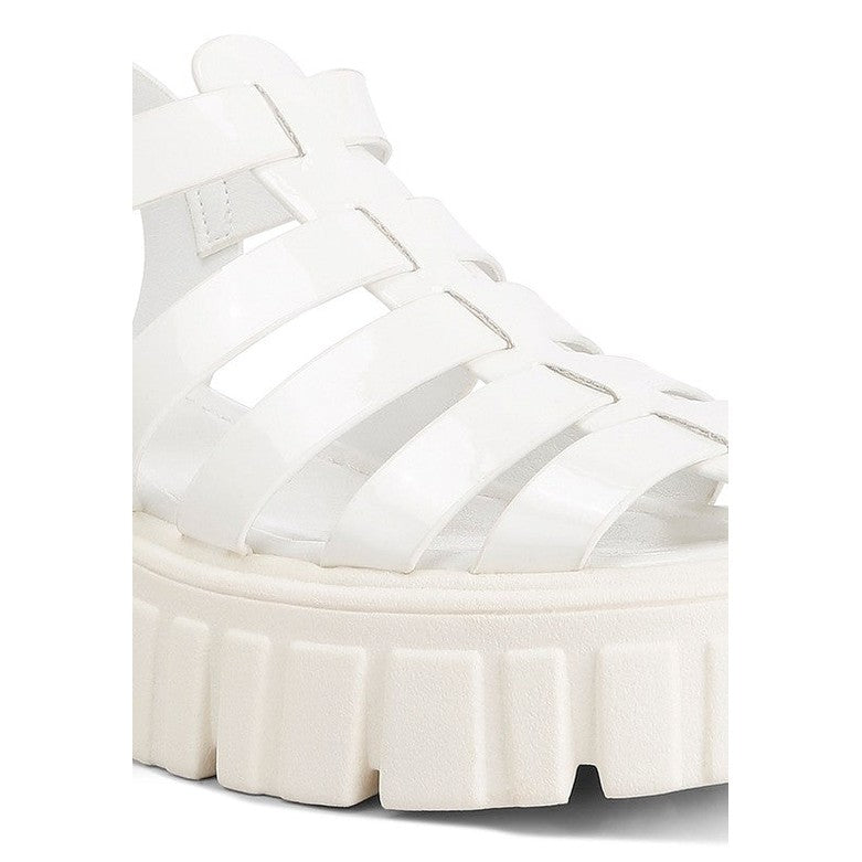 White Zurie chunky gladiator sandals with wide straps and thick platform sole for stylish comfort