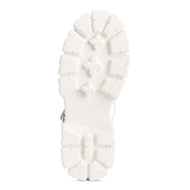 The sole of Zurie chunky gladiator sandals featuring a rugged white traction design for optimal grip.