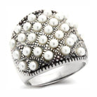 Elegant 925 silver pearl statement ring featuring clusters of pearls in a unique design