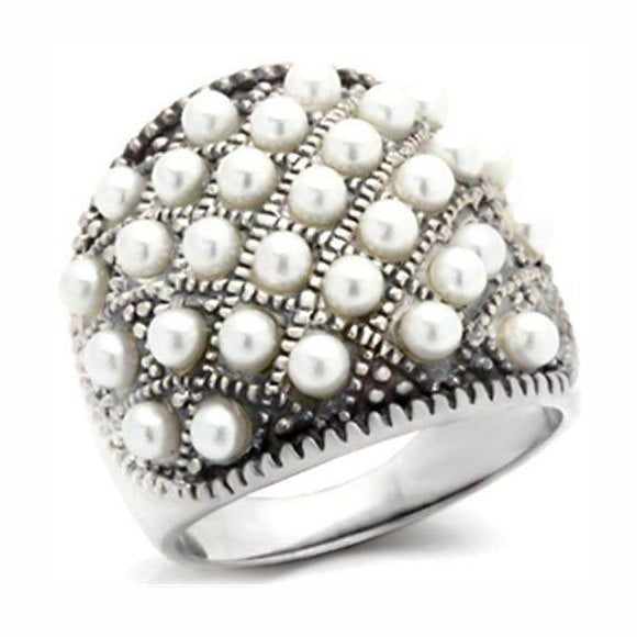Elegant 925 silver pearl statement ring featuring clusters of pearls in a unique design